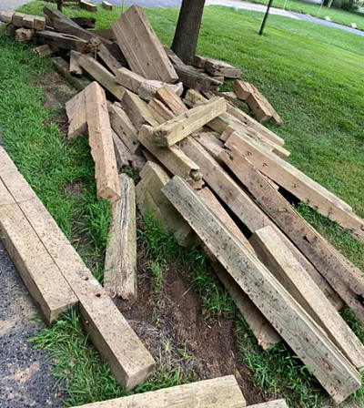 pile of wood from fence construction debris removal job in rialto ca